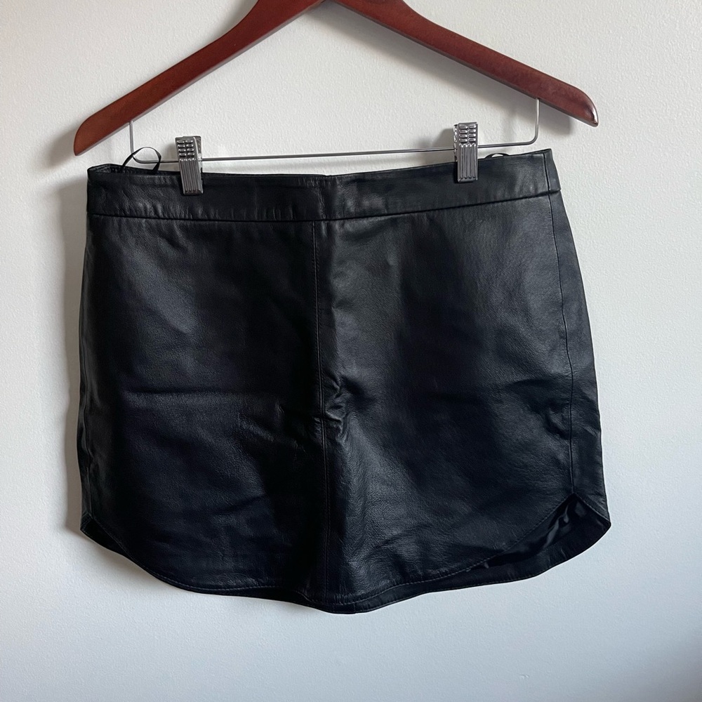 Curve-hem leather skirt
